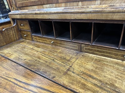 Lot 1316 - AN EARLY 18TH CENTURY HERRINGBANDED FIGURED WALNUT SECRETAIRE CHEST ON CHEST WITH STARBURST BASE