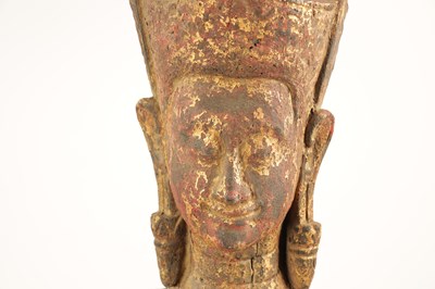 Lot 123 - AN EARLY TIBETAN LIFE-SIZE GILT AND RED LACQUER CARVED STANDING FIGURE OF A BUDDHA