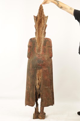 Lot 123 - AN EARLY TIBETAN LIFE-SIZE GILT AND RED LACQUER CARVED STANDING FIGURE OF A BUDDHA