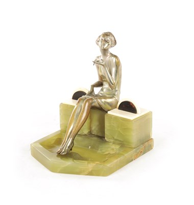 Lot 595 - ATT. JOSEF LORENZL. AN ART DECO SILVERED BRONZE FIGURAL INK STAND