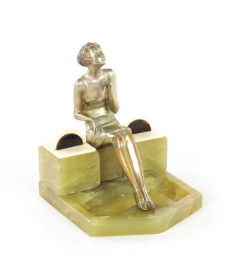 Lot 595 - ATT. JOSEF LORENZL. AN ART DECO SILVERED BRONZE FIGURAL INK STAND