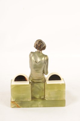 Lot 595 - ATT. JOSEF LORENZL. AN ART DECO SILVERED BRONZE FIGURAL INK STAND