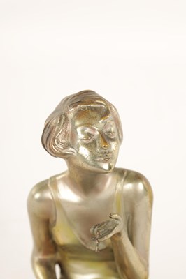 Lot 595 - ATT. JOSEF LORENZL. AN ART DECO SILVERED BRONZE FIGURAL INK STAND