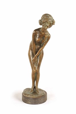 Lot 667 - A SIGNED ART DECO PATINATED BRONZE FIGURAL SCULPTURE