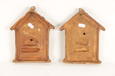 Lot 656 - A PAIR OF LATE 19TH CENTURY TERRACOTTA WALL PLAQUES