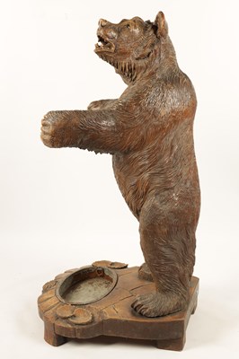 Lot 1145 - A GOOD 19TH CENTURY CARVED LINDEN WOOD BLACK FOREST BEAR STICK STAND OF UNUSUALLY LARGE SIZE