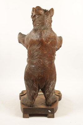 Lot 1145 - A GOOD 19TH CENTURY CARVED LINDEN WOOD BLACK FOREST BEAR STICK STAND OF UNUSUALLY LARGE SIZE