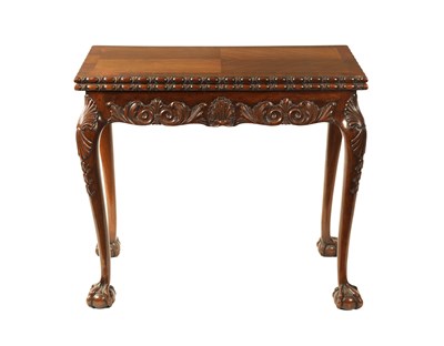 Lot 1210 - A GEORGE II STYLE CARVED MAHOGANY FOLD OVER CARD TABLE