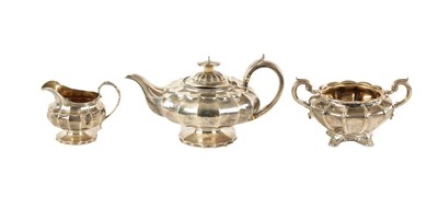 Lot 419 - AN ASSOCIATED LATE GEORGIAN SILVER MELON-SHAPED THREE-PIECE TEA SERVICE