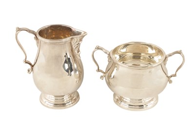 Lot 421 - AN ELIZABETH II HEAVY GAUGE SILVER SUGAR BOWL AND MILK JUG