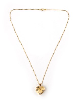 Lot 365 - A HALLMARKED 9CT YELLOW GOLD HEART-SHAPED LOCKET AND FINE NECK CHAIN