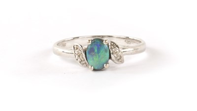 Lot 326 - AN 14K WHITE GOLD AND BLACK OPAL SET LADIES RING