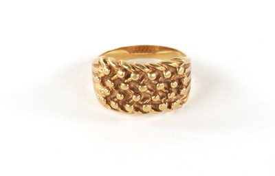 Lot 323 - A HALLMARKED YELLOW GOLD DRESS RING