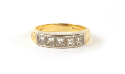 Lot 353 - A .750 HALLMARKED YELLOW AND WHITE GOLD MODERN SET DIAMOND RING