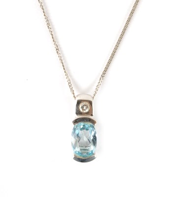 Lot 368 - A GOOD .750 HALLMARKED WHITE GOLD PALE BLUE TOPAZ AND DIAMOND PENDANT