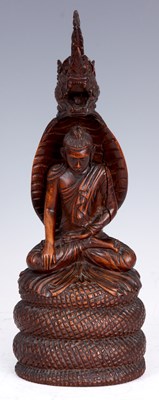 Lot 223 - A 19th CENTURY CARVED BURMESE ROSEWOOD STATUE...