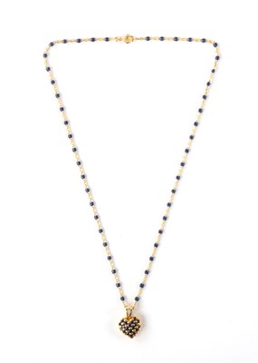 Lot 332 - A .750 HALLMARKED YELLOW GOLD AND LAPIS LAZULI HEART PENDANT WITH MATCHING FINE LINK CHAIN