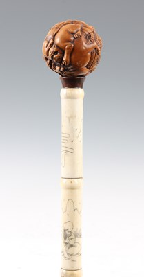 Lot 224 - A CHINESE SECTIONAL BONE WALKING CANE WITH...