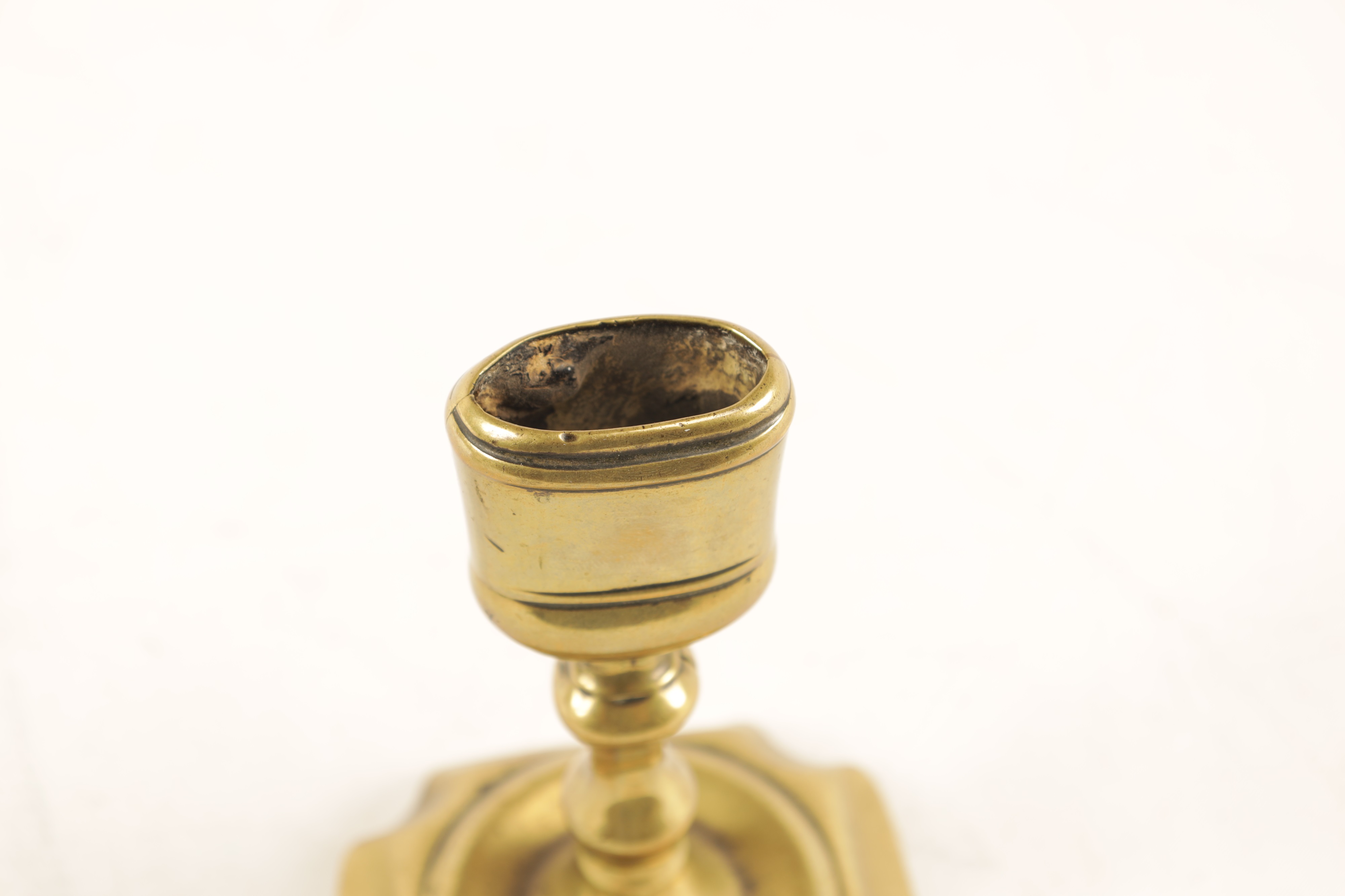 Lot 502 A RARE QUEEN ANNE BRASS CANDLE SNUFFER STAND