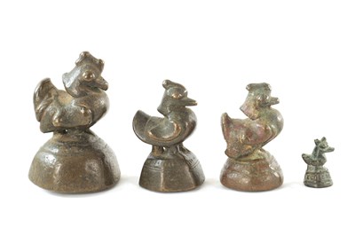 Lot 208 - A SET OF FOUR 18TH/19TH CENTURY GRADUATED BRONZE OPIUM WEIGHTS