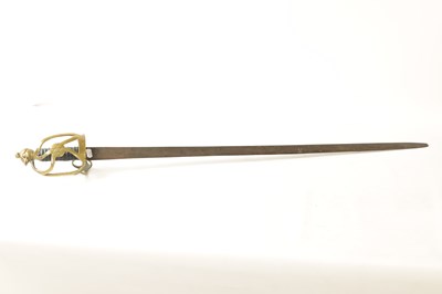 Lot 481 - A 18TH CENTURY BRASS HILTED BROADSWORD WITH EAGLE POMMEL