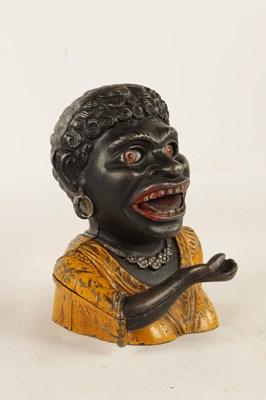 Lot 583 - AN EARLY 20TH-CENTURY CAST IRON 'DINAH' MONEY BOX