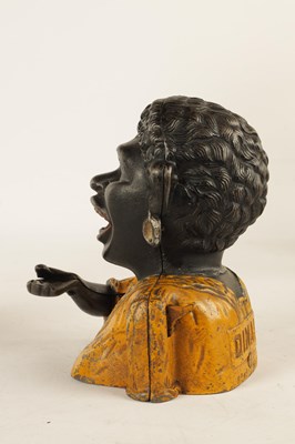 Lot 583 - AN EARLY 20TH-CENTURY CAST IRON 'DINAH' MONEY BOX