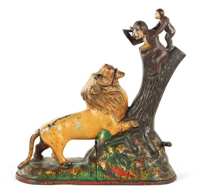 Lot 584 - A LATE 19TH CENTURY AMERICAN PAINTED CAST IRON 'LION AND TWO MONKEYS' MONEY BOX