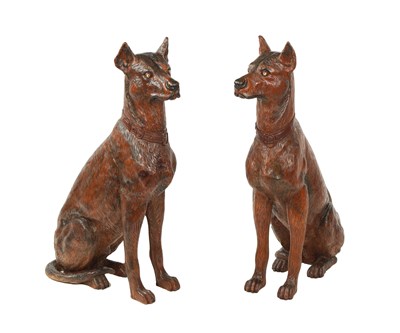 Lot 641 - A PAIR OF LIFE-SIZE BLACK FOREST STYLE CARVED WOOD SCULPTURES