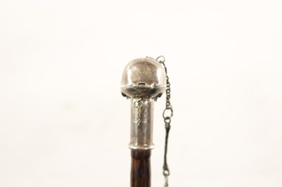 Lot 574 - AN UNUSUAL 19TH CENTURY SILVER TOPPED WALKING STICK WITH HINGED SKULL POMMEL