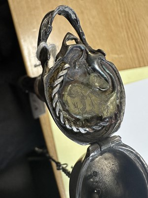 Lot 574 - AN UNUSUAL 19TH CENTURY SILVER TOPPED WALKING STICK WITH HINGED SKULL POMMEL