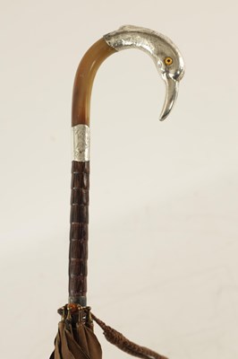 Lot 563 - A 19TH CENTURY HORN AND SILVER-TOPPED PARASOL FORMED AS A SWAN'S HEAD