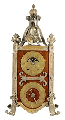Lot 978 - AN UNUSUAL FRENCH ARTS AND CRAFTS MANTEL CLOCK WITH AXE MOON AND CALENDAR DIAL