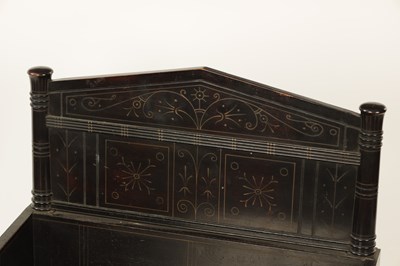 Lot 1202 - A LATE 19TH CENTURY AESTHETIC PERIOD EBONISED COUNTRY HOUSE WINDOW SEAT IN MANNER OF CHRISTOPHER DRESSER POSSIBLY BY CHUBB