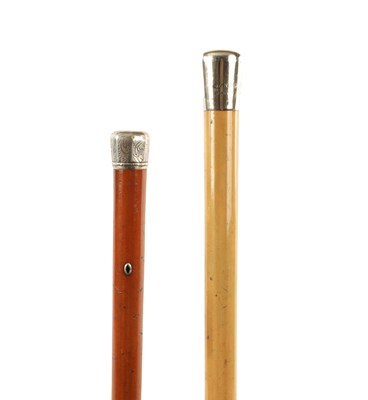 Lot 561 - TWO LATE 19TH CENTURY SILVER MOUNTED WALKING STICKS