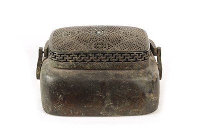 Lot 307 - AN EARLY CHINESE QING DYNASTY BRONZE HAND WARMER