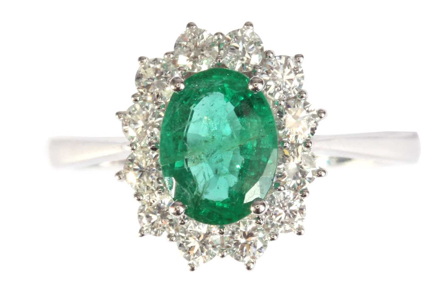 Lot 260 An 18ct White Gold Emerald And Diamond Ring 1400