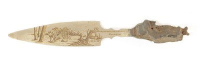 Lot 456 - WAR SOUVENIER. A STEEL KNIFE WITH ENGRAVED CANNON ON THE BLADE MADE FROM A PIECE OF SHRAPNEL