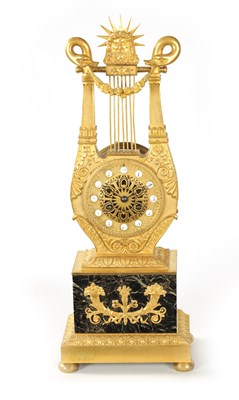 Lot 689 - A 19TH CENTURY FRENCH ORMOLU AND VERDI ANTICO LYRE SHAPED MANTEL CLOCK