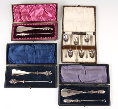 Lot 289 - THREE EDWARDIAN CASED SETS OF BUTTON HOOKS AND...