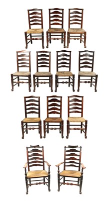 Lot 965 - A GOOD SET OF TEN GEORGE III ELM AND FRUITWOOD LADDER BACK DINING CHAIRS AND 2 OTHERS