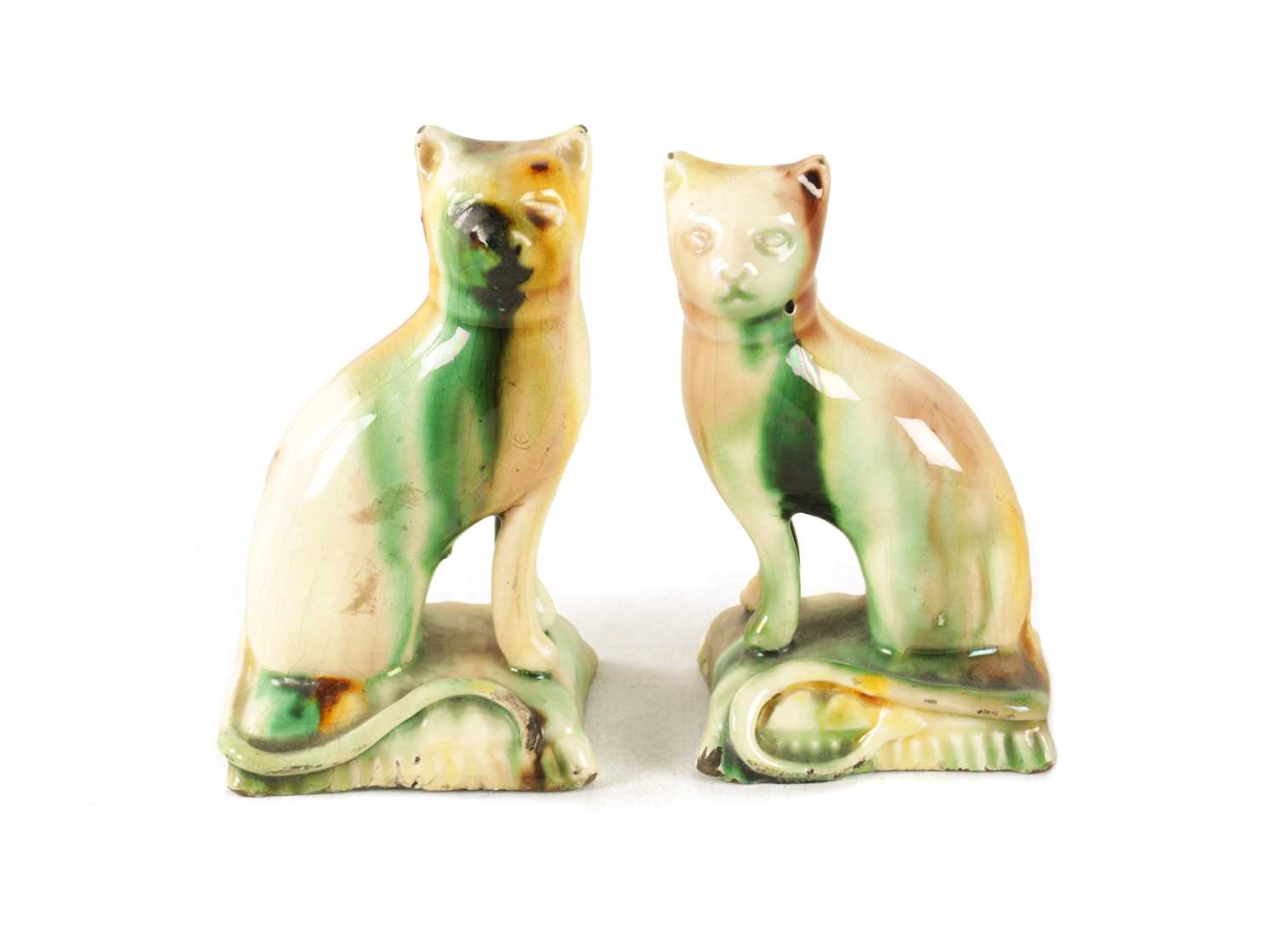 Lot 29 - A PAIR OF LATE 18TH CENTURY WHIELDON TYPE POTTERY CATS