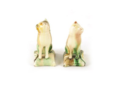 Lot 29 - A PAIR OF LATE 18TH CENTURY WHIELDON TYPE POTTERY CATS