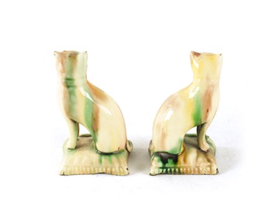 Lot 29 - A PAIR OF LATE 18TH CENTURY WHIELDON TYPE POTTERY CATS