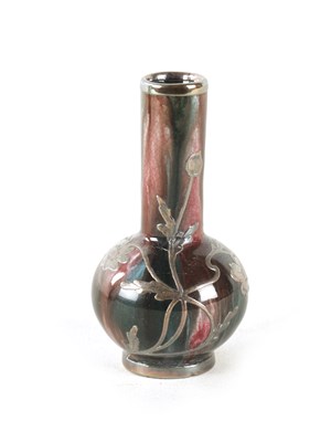 Lot 26 - A SMALL ART NOUVEAU SILVER OVERLAYED PORCELAIN VASE