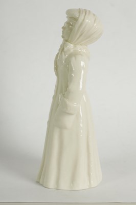 Lot 9 - THE MOTORIST. A VERY RARE ROYAL WORCESTER PORCELAIN CANDLE EXTINGUISHER