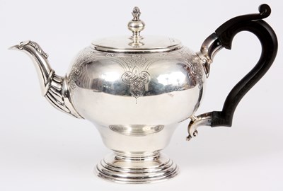 Lot 299 - AN IRISH SILVER TEAPOT with ebony handle and...