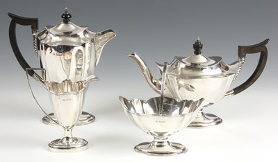 Lot 300 - A FOUR PIECE SILVER TEA SERVICE of slender...