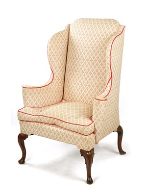 Lot 823 - A QUEEN ANNE WING BACK UPHOLSTERED ARMCHAIR