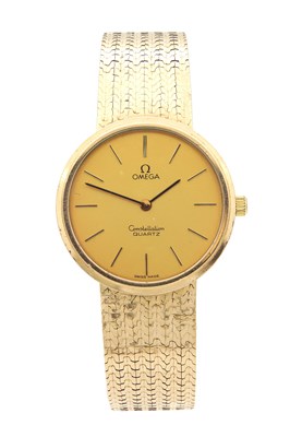 Lot A 9CT GOLD OMEGA CONSTELLATION GENTLEMAN'S QUARTZ WRISTWATCH ON A MILANESE STYLE BRACELET WITH LADDER CLASP